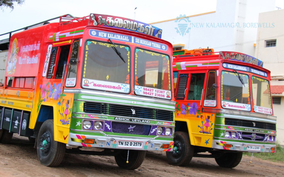 Two trucks with a vibrant design, showcasing new kalaimagal contact number and a burst of colors